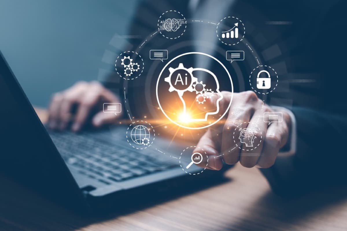 Marketer analyzing AI search optimization strategies comparing AEO and GEO approaches on a laptop