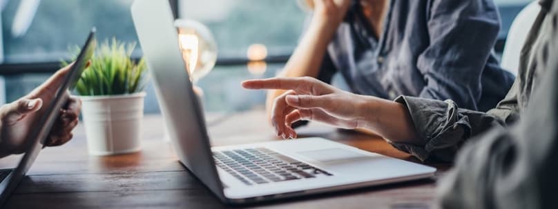 Consumer using AI-powered shopping assistant on laptop — the shift from browsing to AI-driven product discovery