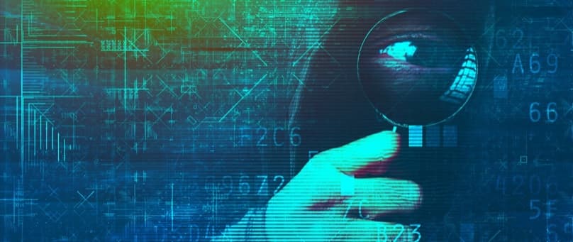 Person researching AI search results on a laptop, representing the shift from traditional search rankings to LLM citation-driven traffic