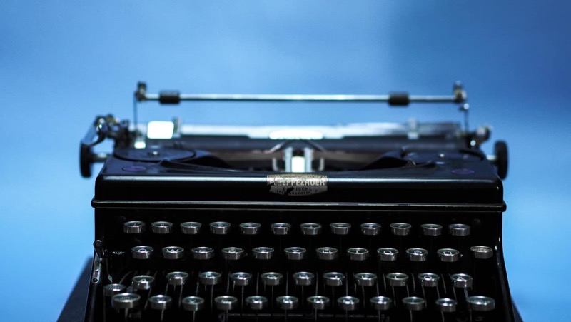 Content writer crafting an SEO blog post with research and analytics tools