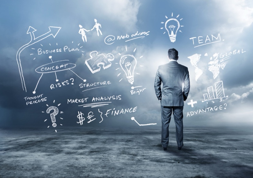 Small business owner reviewing finances during their first year of operation